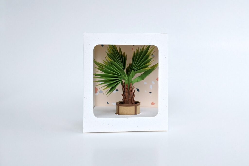 mini paper palm tree in window box